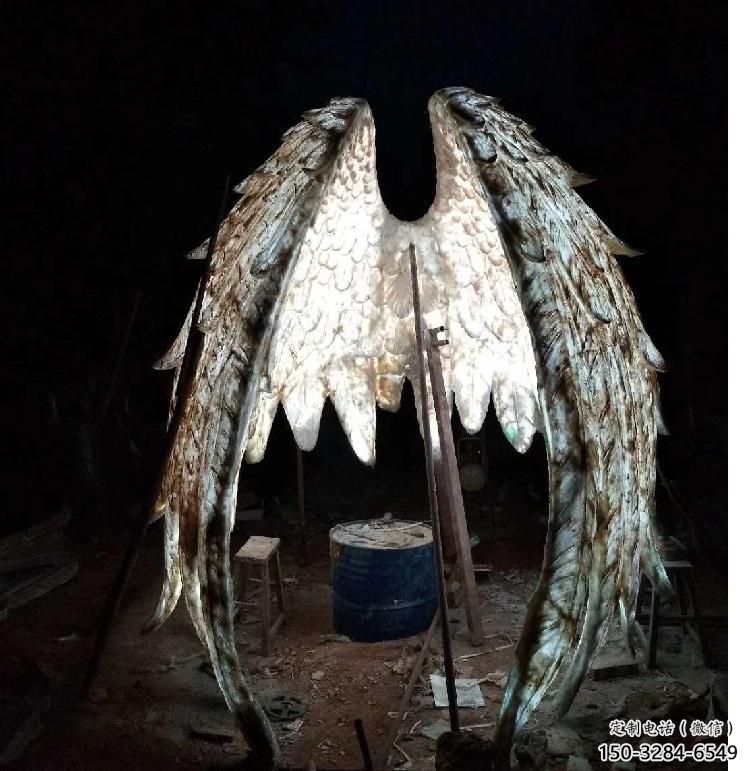 城市翅膀雕塑，網(wǎng)格燈光雕塑，古銅效果