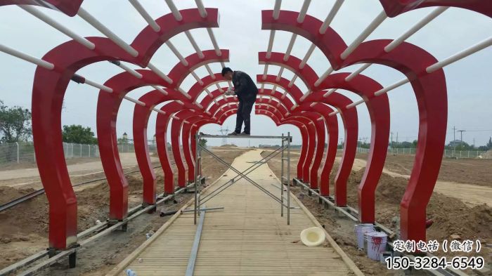 隧道大門雕塑廠家，烤漆美陳雕塑，抽象建筑設計